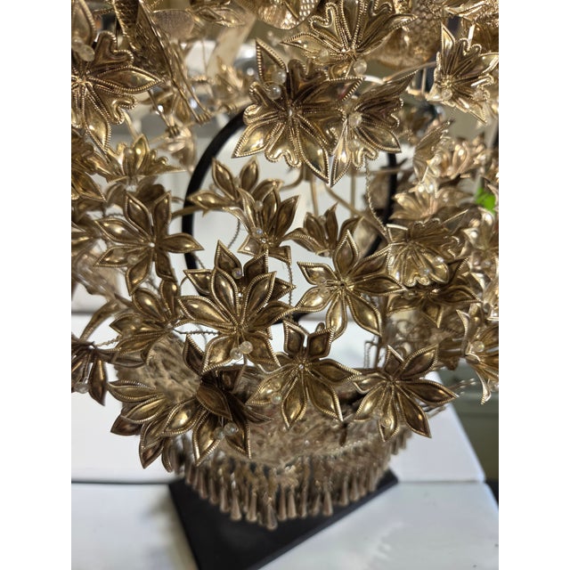 A very rare vintage silver headdress and stand. made by the Miao people in Myanmar and used for weddings and special...