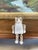 Charming hand-carved wooden tiger/cat figurine featuring articulated limbs strung with cord, allowing the legs and arms to...