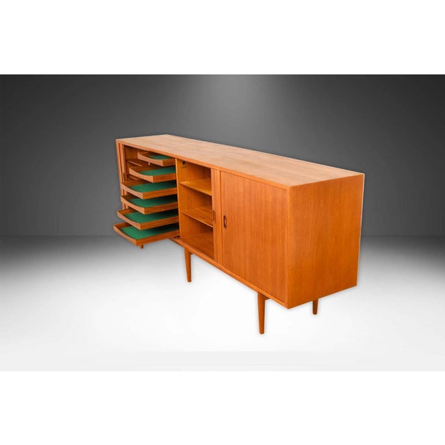 Exceptional Mid-Century teak, rare, sliding tambour door, credenza designed by Arne Vodder for Sibast Mobler made in...