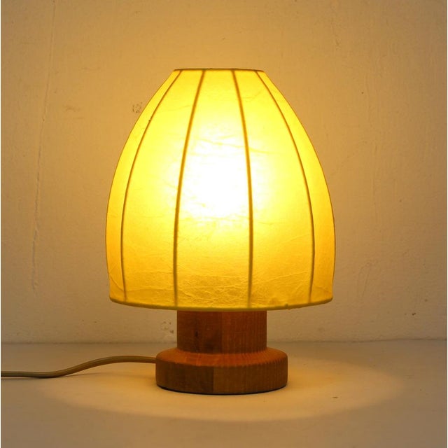 Wooden and Cocoon Table Lamp, 1960s, in Very Good conditions. Designed 1960 to 1969 European Plug (up to 250V).The wiring...