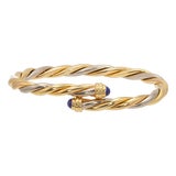 1990s Cartier 18k Gold Cabochon Lapis Lazuli Torque Bangle Bracelet For Sale