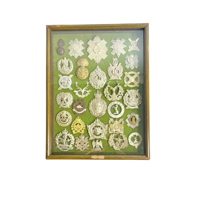Amazing set of 29 different Victorian era and later. Scottish regimental badges. These have been gathered and framed in a...