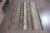 Bring a grounded, mid-century charm to your space with this authentic Anatolian patchwork rug. Carefully assembled from...