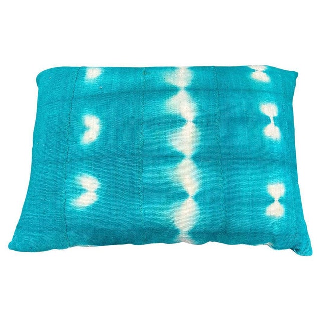 Green over-dyed mud cloth Mali textile from West Africa, made into a pillow. Double backed with concealed zipper. Insert...
