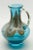 Beautiful hand blown art glass pitcher with agate-colored swirls. A fantastic mingling of contemporary and classical...