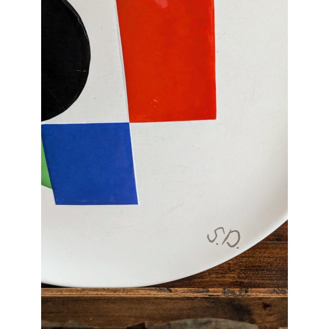 Sonia DELAUNAY - Abstraction in Colora - Enameled Ceramic Plate, 1985 (Artcurial, Paris) Diameter: 24.70 cm | 9.72 in...