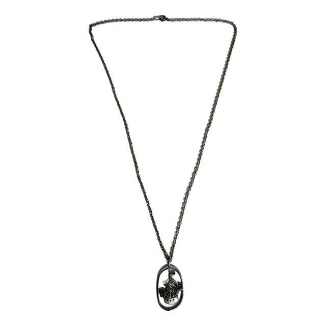 Sterling Silver Necklace With a Multi-Masted Sailing Ship Pendant Inside an Open Oval Wire Frame For Sale