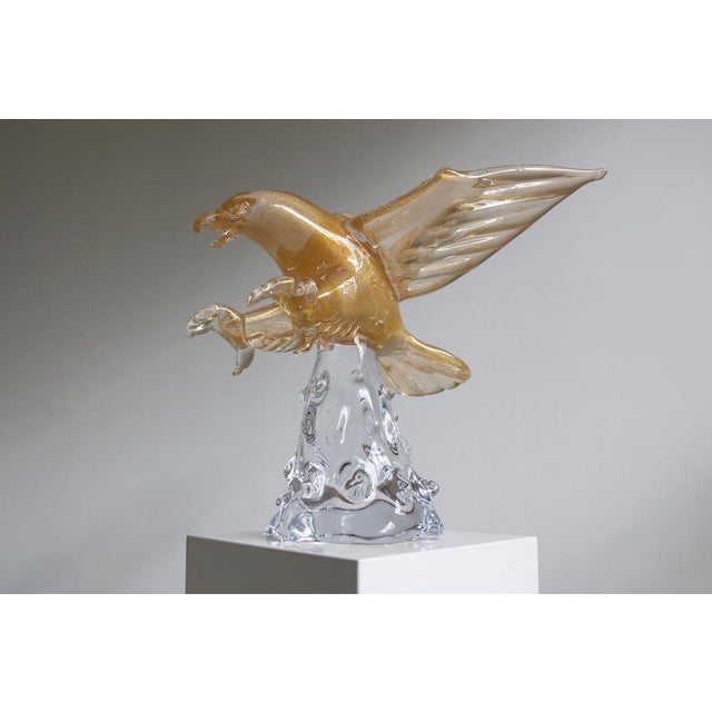 A dramatic Murano glass eagle sculpture signed by Italian glass master Arnaldo Zanella. Hand-blown in Murano during the...