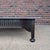 An impressive large-scale coffee table featuring a striking white mosaic tile top set within a dark stained hardwood...