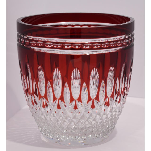 A vintage Waterford Crystal Clarendon pattern ice bucket in ruby cut to clear. Circa 1997 - 2008. Measures 7 3/8" high x...