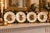 What a find! A fabulous set of four vintage porcelain plates created exclusively for Neiman Marcus, each featuring a...