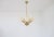 A 1950s Finnish design ceiling lamp with five light sources. The lamp is stamped Sario and sold at the Stockmann...