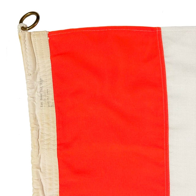 This large vintage signal flag is made from a soft synthetic cloth in neon color, with a similar look and feel of cotton...