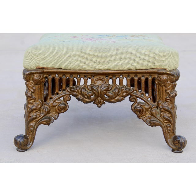 Vintage 1940s Rococo Revival Gilt Cast Iron Footstool With Floral Needlepoint Cushion For Sale - Image 4 of 13