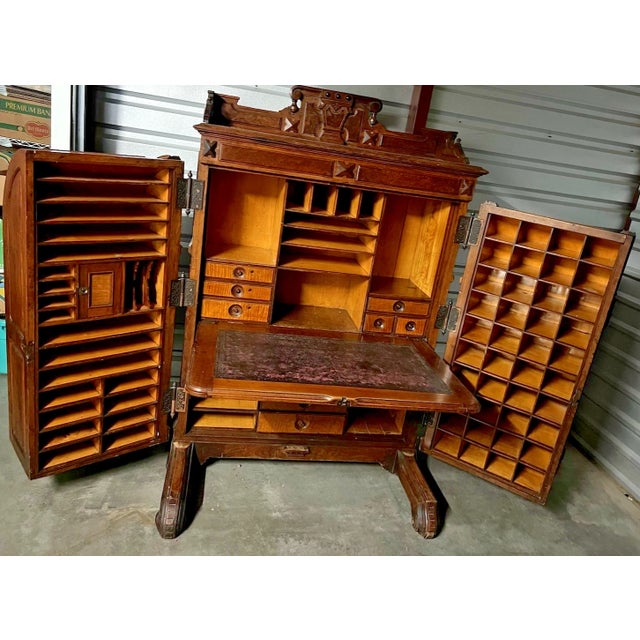 An absolute masterpiece of 19th-century American craftsmanship, this authentic antique Wooton Patent Desk is a legendary...