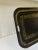 This hard working and beautiful black tole metal service tray is decorated with gold trim and gold and green flowers and...