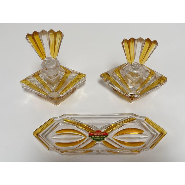 Art Deco Bohemian Bleikristall Crystal Vanity Set, Amber Cut Glass, circa 1930s An exceptional Art Deco vanity set in...