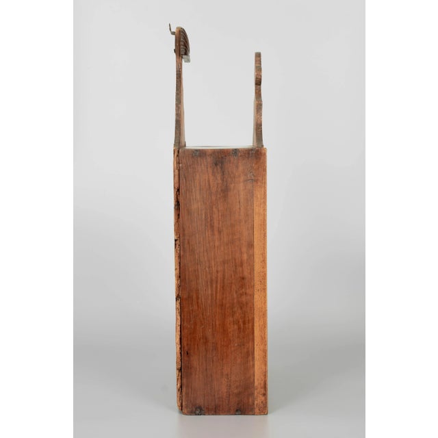 A 19th century French Provençal fariniere, or decorative box made of walnut with fine hand-carved decoration. Waxed...