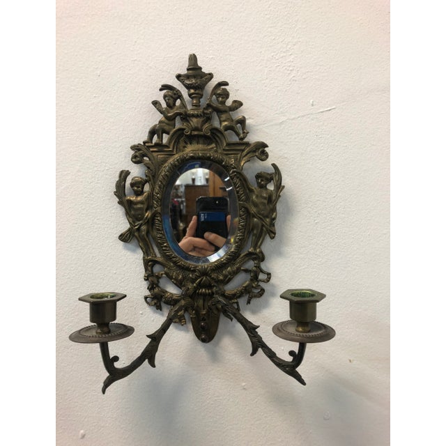 Vintage Cherubs brass wall beveled mirrored sconces with two candles holders approx 10 inches wide x 13 inches height