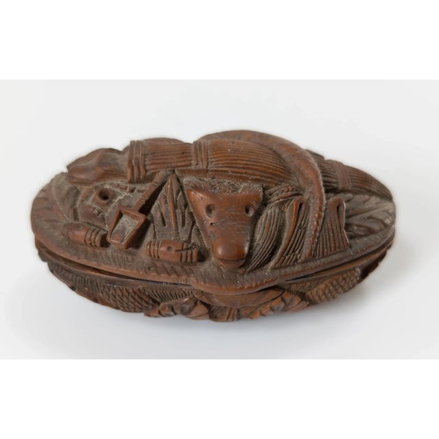 We are selling this very unique and unusual snuff box. This snuff box appears to be carved from coconut or another unusual...