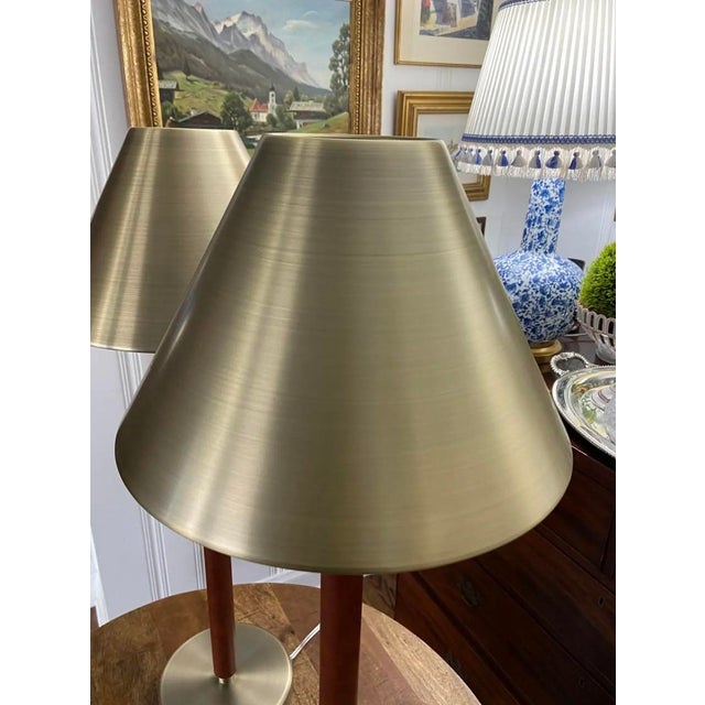 Beautiful pair of leather wrapped and brushed brass extra tall buffet lamps from Ralph Lauren. Unsure If the leather...