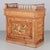 A rustic Country French comptoir or store counter, made of pitch pine with trimmed panels and decorated on the front with...