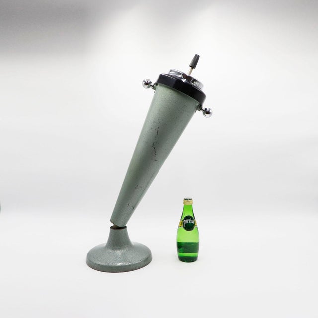 Circa 1950. We offer this Rare Vintage Standing and Articulated Ashtray Ashstand. Made of steel and bakelite with original...