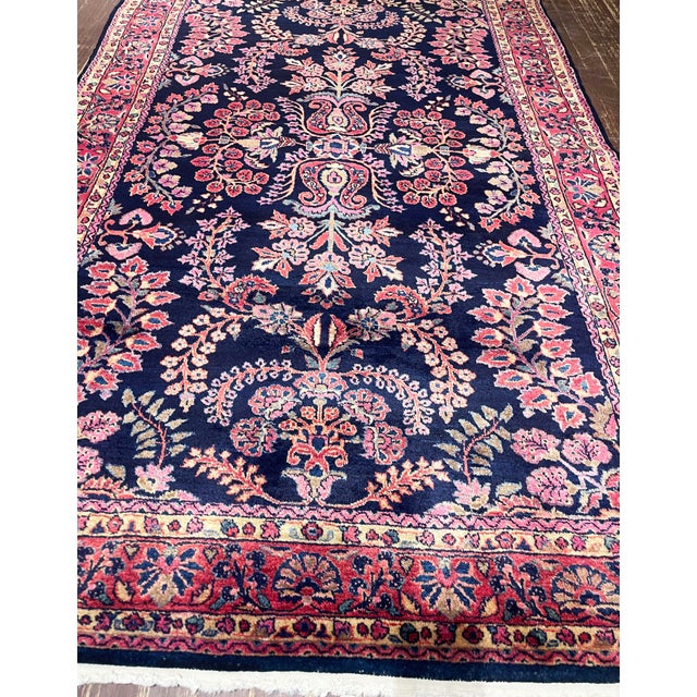 This beautiful antique Persian Mohajeran Sarouk rug, woven around 1910, is an outstanding example of the highly regarded...