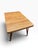 A distinctive vintage Mid-Century Modern dining table crafted from solid oak and featuring an unusually sculptural...