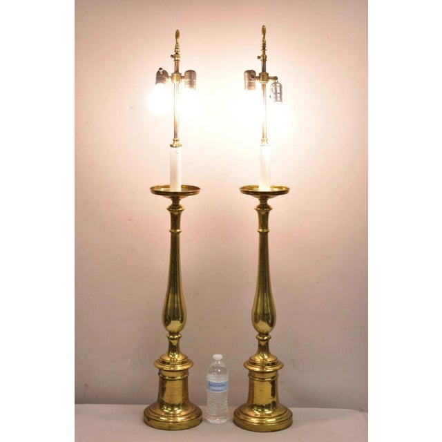 Vintage Hollywood Regency Tall Lacquered Brass Candlestick Table Lamps a Pair. Circa Late 20th Century. Measurements: 45 &...
