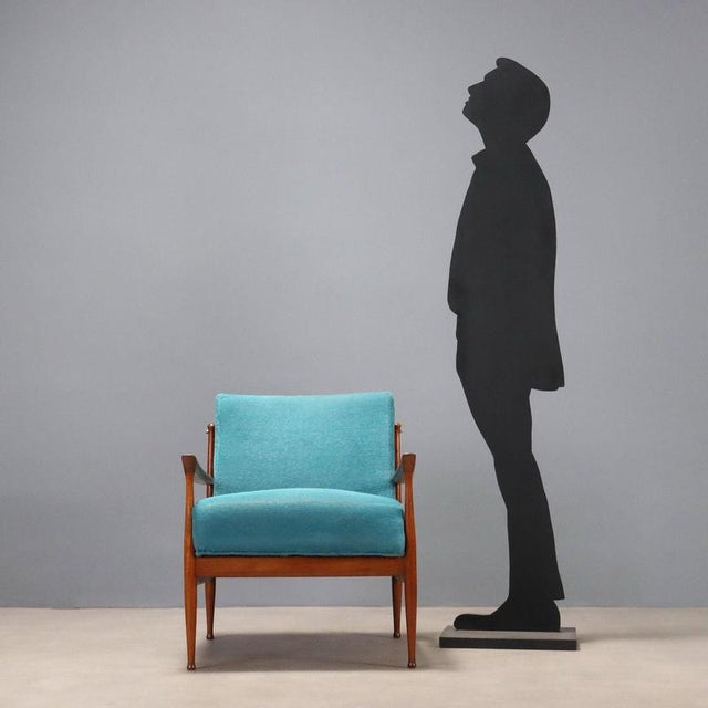 This 1960s armchair from Northern Europe is a perfect example of vintage design. The frame is crafted from fine teak wood,...