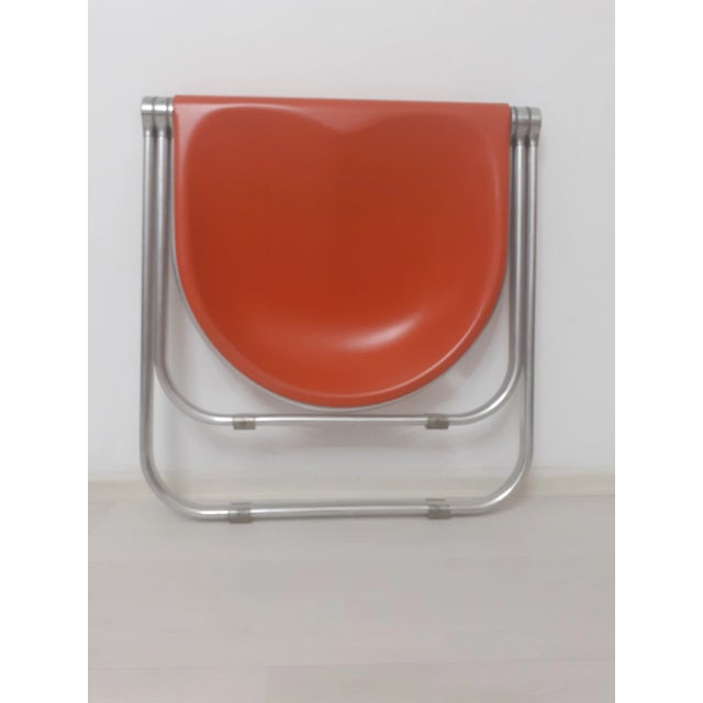 Plato folding desk in the rare version without the grooves on the top, combined with the Pluff folding stool, both by...