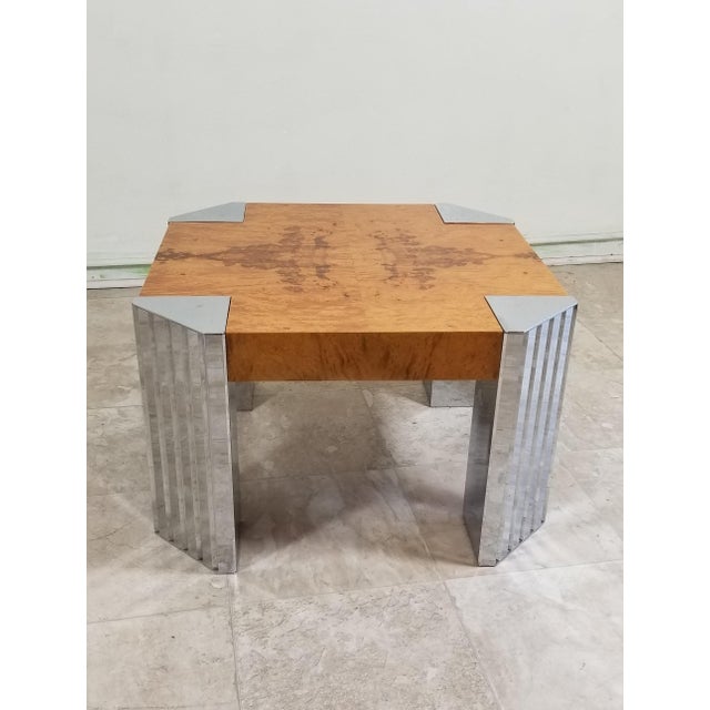 Very attractive coffee table, top is made out of olive ash burl wood Beautiful blond color that makes a nice contrast with...