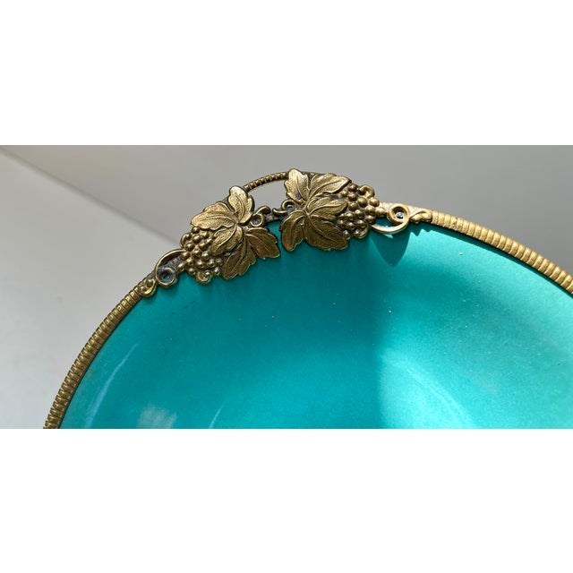 Beautiful turquoise Green pottery dish designed by Danish ceramist Christian Jensen in the 1930s. Brass mountings/accents...