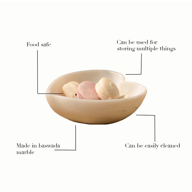 A refined blend of craftsmanship and sentiment, this heart-shaped bowl is hand-carved from solid Indian marble by skilled...