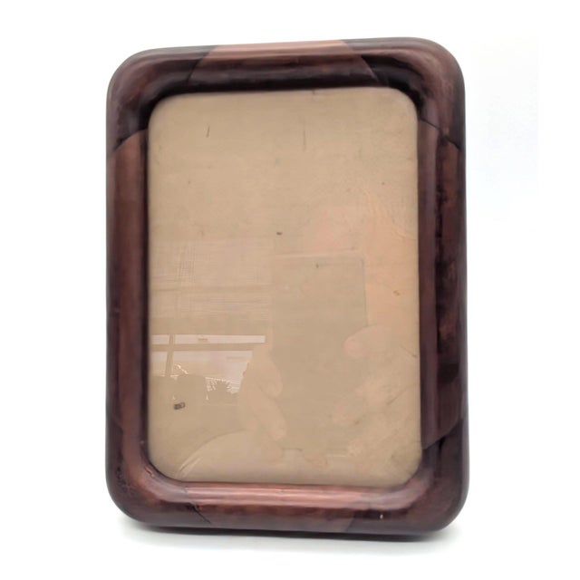 Offered is a vintage 1970s Rosewood frame with bull-nosed corners made in Thailand. It measures 5.75" W x 7.75" H x 1" D...