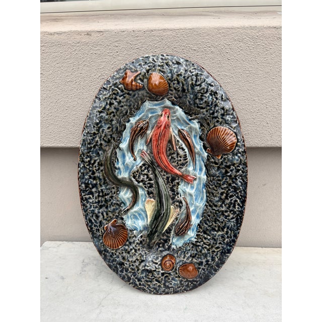 French Palissy wall platter with fishs , shells, circa 1900 possibly Choisy le Roi. 13.8 by 9.3 inches. Reference/page 146...
