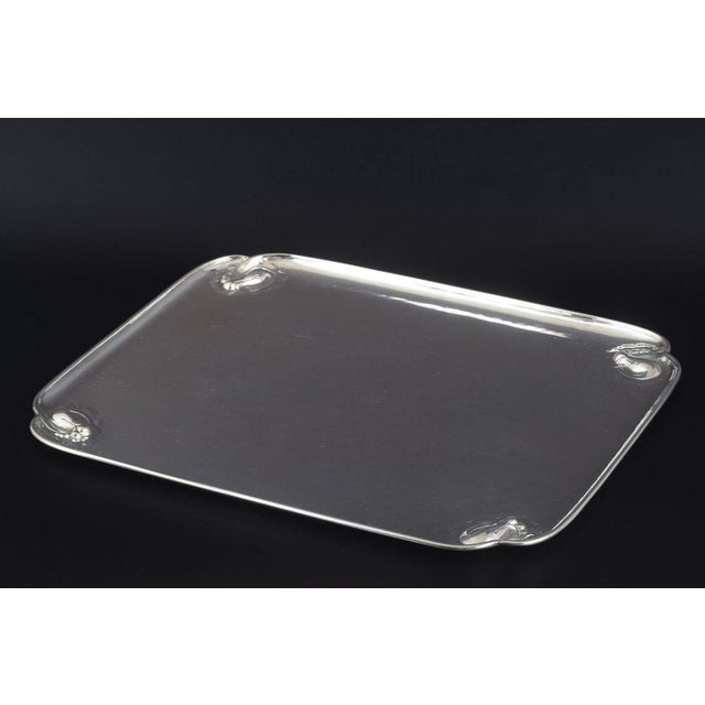 Georg Jensen, Denmark. Rectangular silver tray with “Magnolia Blossom” decoration, model 2B, 1933–1944. Elegant, solid...