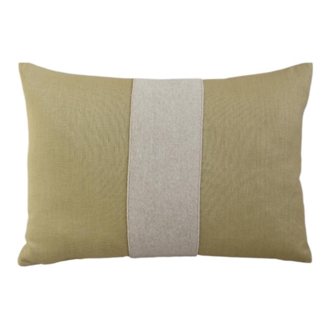 Custom-tailored pillow created from a gold linen textile. Pillow has a cream-colored wool appliqué stripe on the front....
