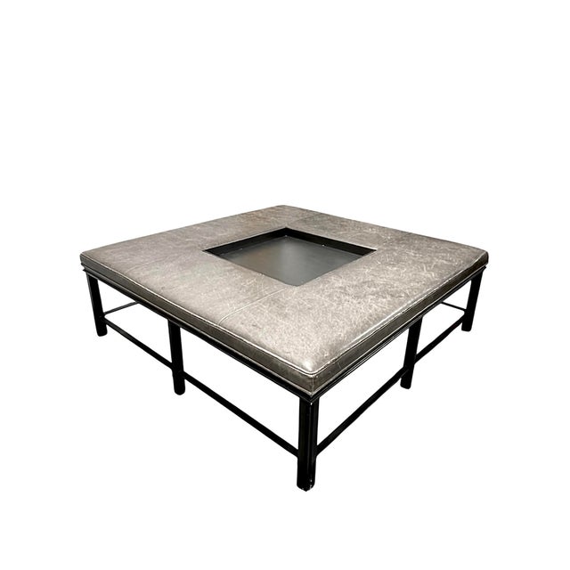 Baker Furniture Porter Ottman model #4052, designed by Bill Sofield. Features a tightly upholstered charcoal leather top...