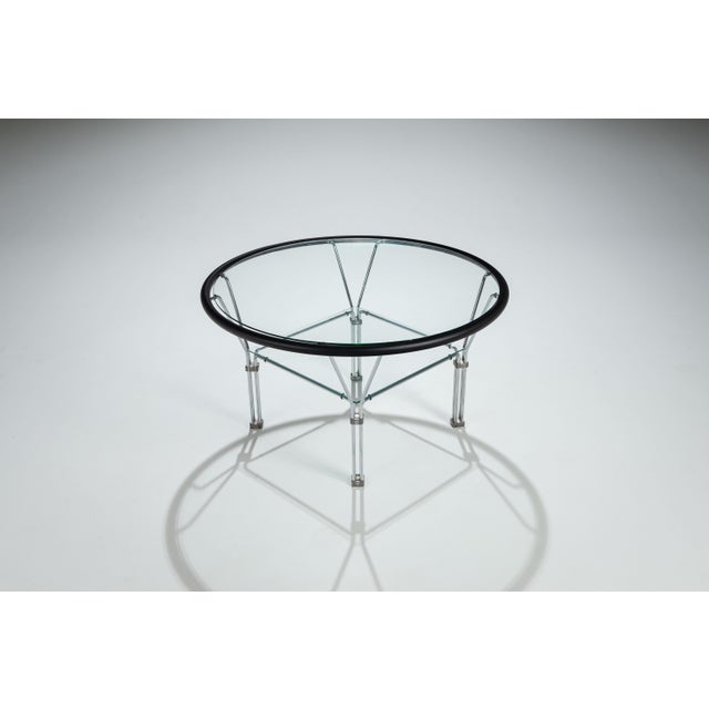 This striking Post-Modern coffee table, attributed to Danish-Canadian designer Niels Bendtsen, is a refined exploration of...