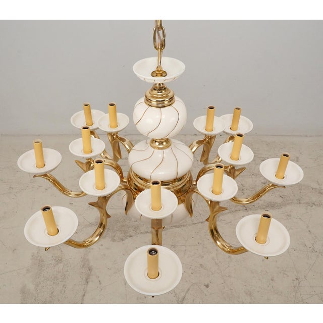 Mid 20th century Italian made chandelier in the Neoclassical Revival style. This style is known for white porcelain...