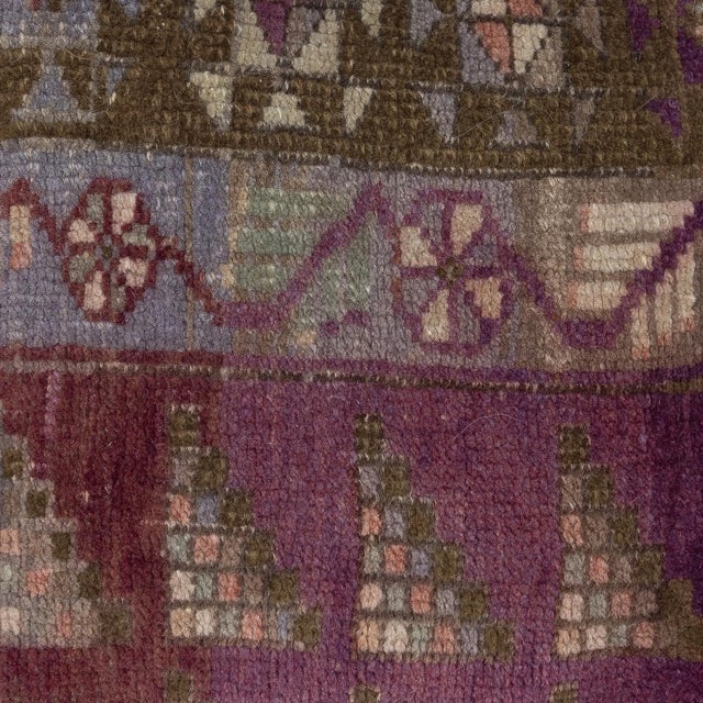 Add a touch of history and warmth to your space with this vintage handmade Turkish wool rug cushion cover. Crafted from...