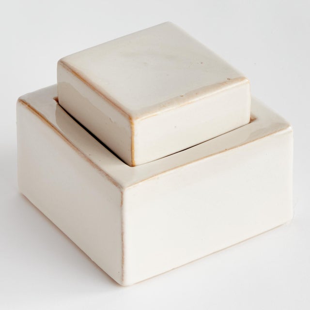With its sleek lines, contemporary design and reactive glaze, this lidded jar is perfect for both modern and traditional...