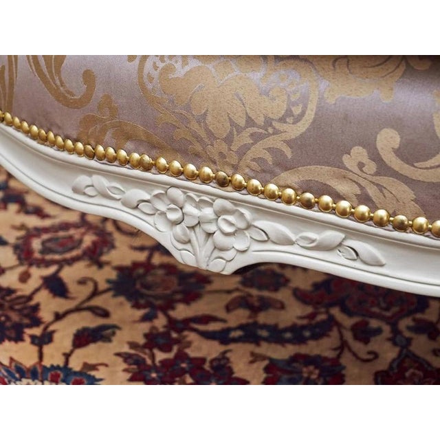 Completely restored armchair made of solid beech in the Louis XV rococo style. The armchairs are hand-carved. Luxurious...
