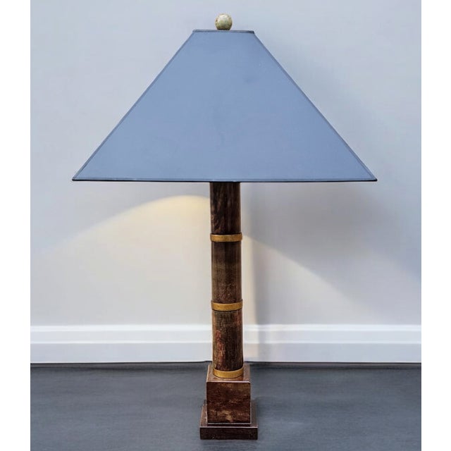 This Vintage Machine Age Hollywood Regency Style Marble Tall Table Lamp is a distinctive and seductive lighting element...