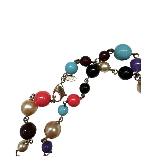 This is part of Chairish’s Costume Jewelry assortment. - Chanel long strand multicolor and faux pearl necklace - Made in...