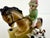 Charming vintage porcelain figural holder by Hiten Japan featuring a young rider atop a horse accompanied by two playful...