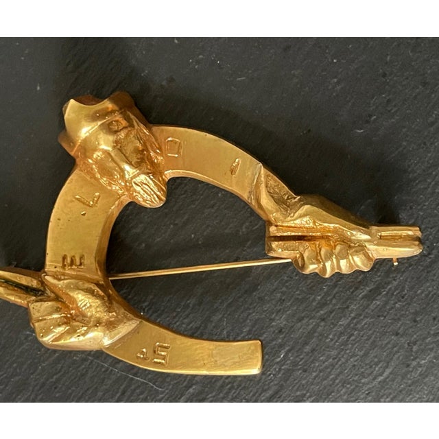 A rare bronze brooch St Eloi by Parisian art jeweler Line Vautrin ((French, 1913–1997) circa 1946. Brilliantly designed in...