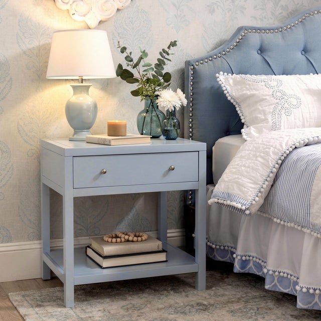 Enhance your bedroom or living space with the Butler Specialty Company Nora Wide Nightstand, a stylish blend of modern...